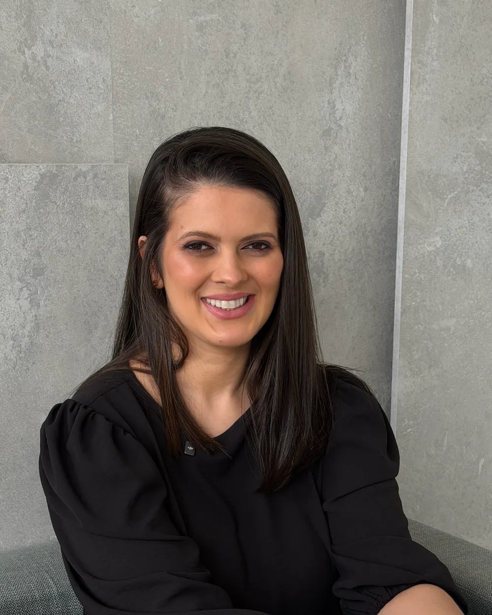 Dra. Lúcia Ribeiro em seu consultório